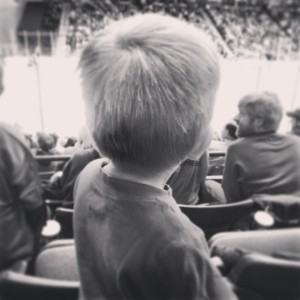 A little boy's first hockey game.